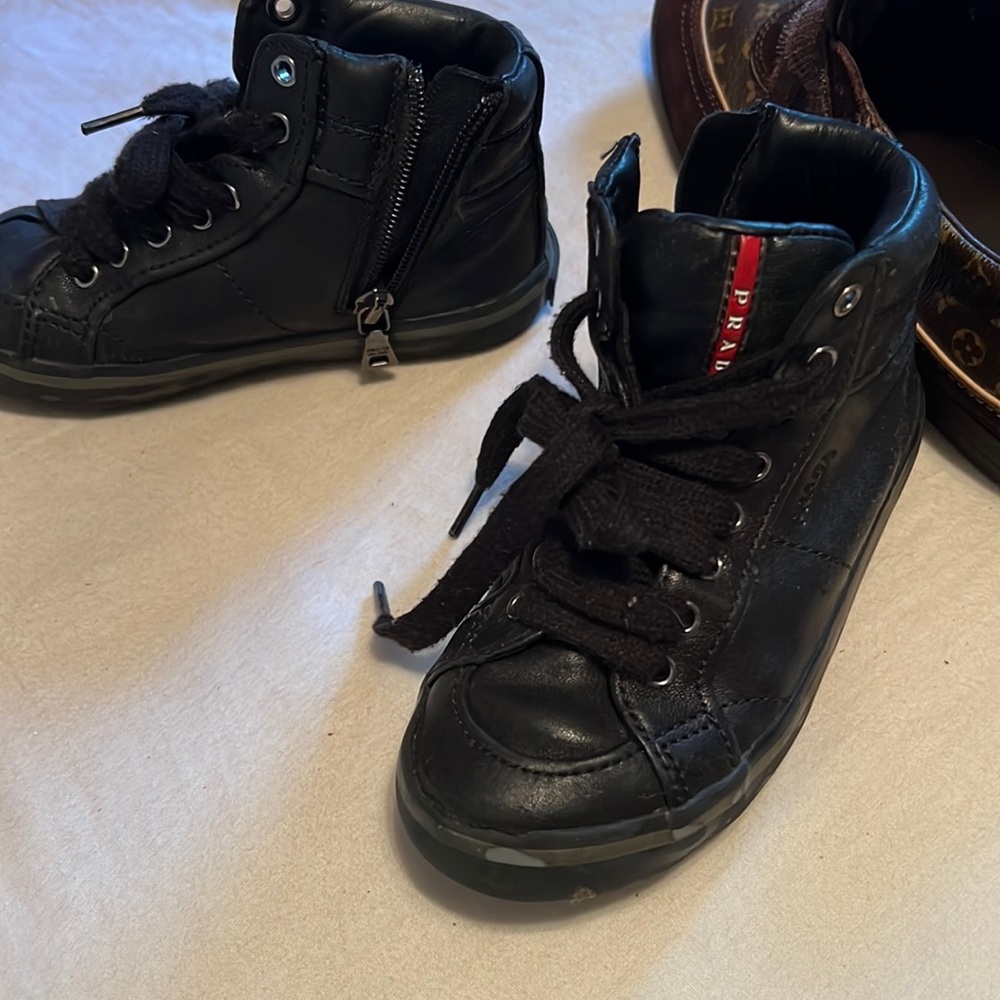Prada boots for boy or girl worm but has lots of life life